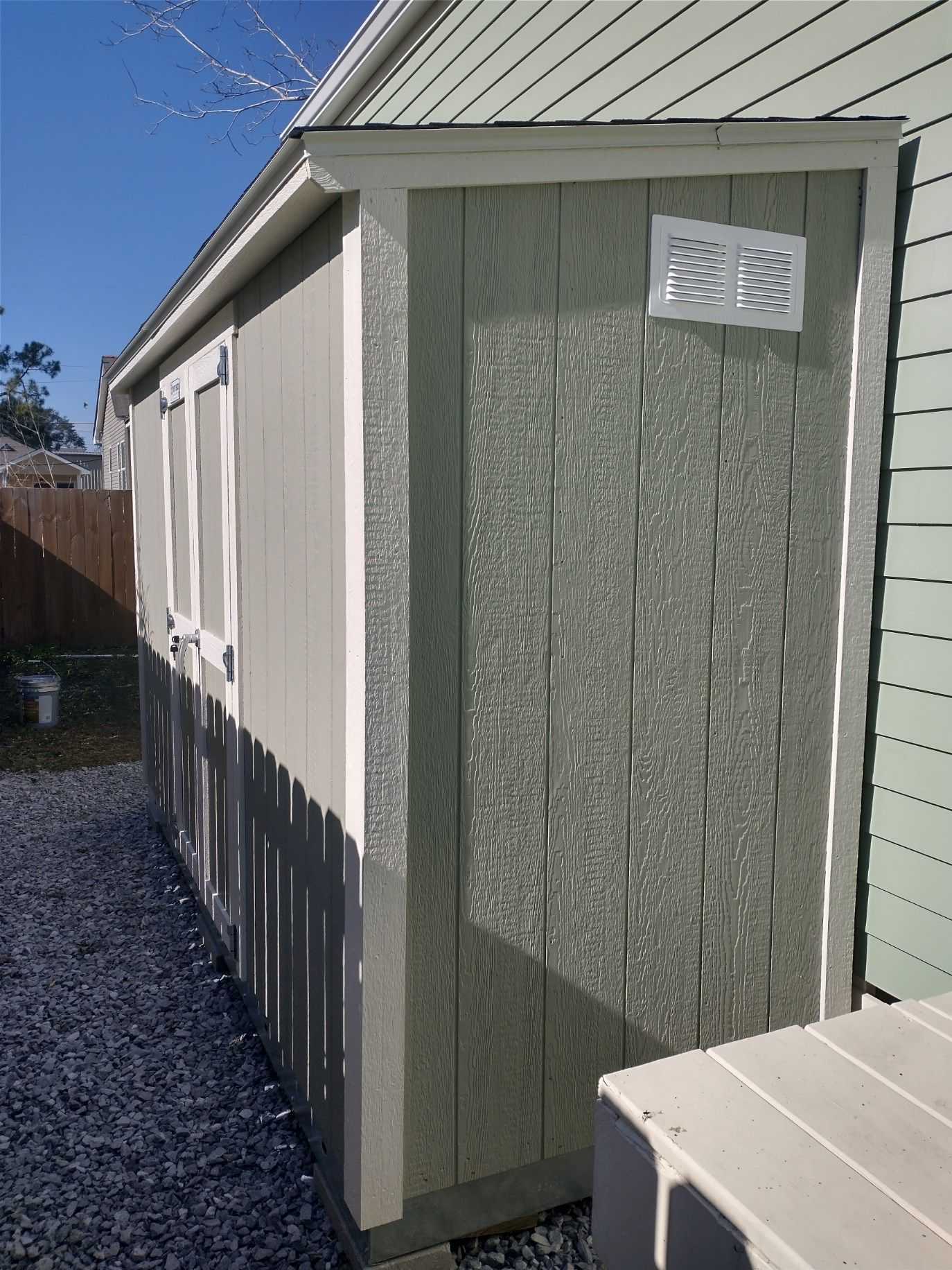 Sundance Lean-to thats used for extra home storage. The building is on the side of the home.