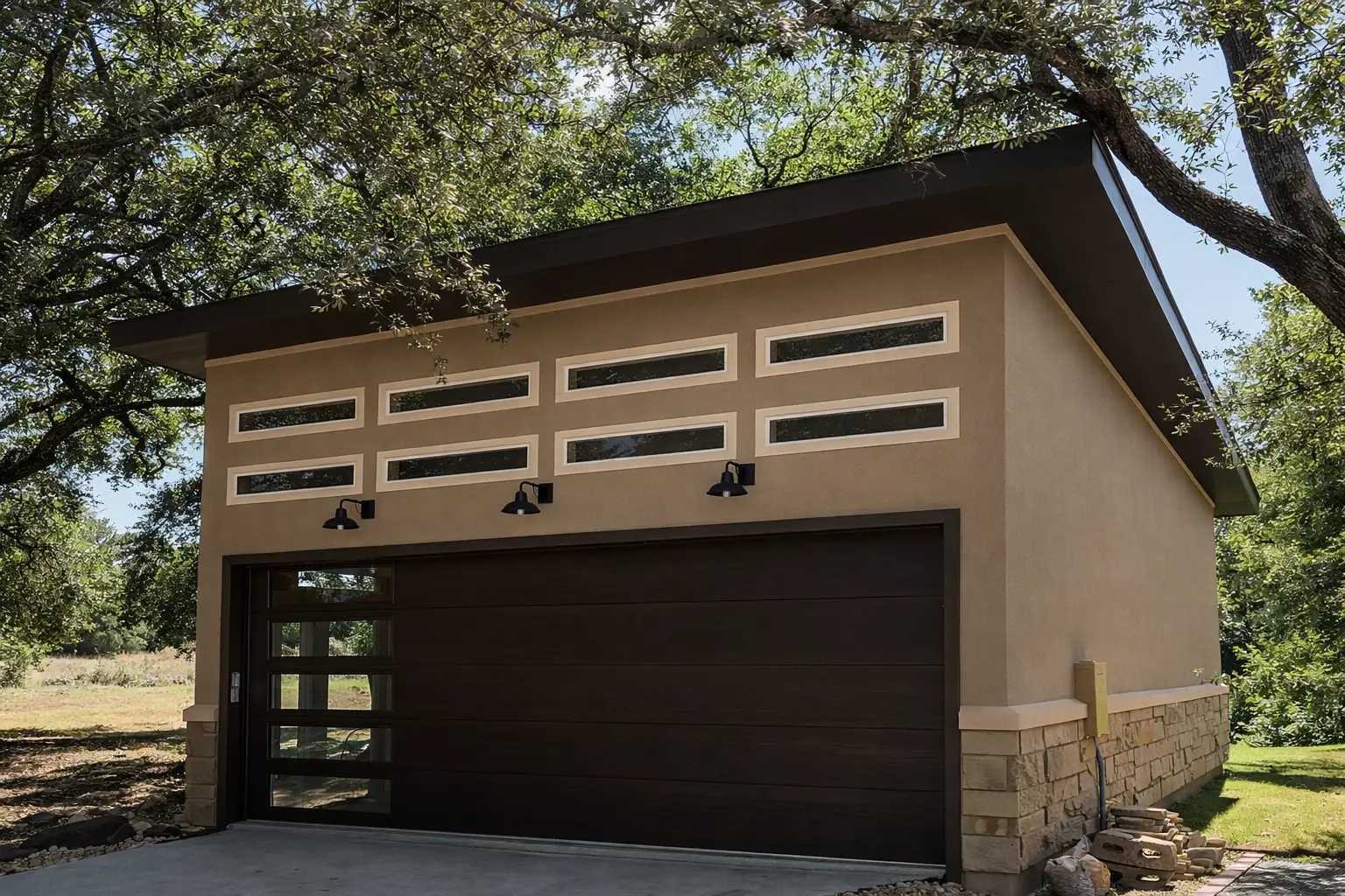 Modern garage with a sloped roof, multiple narrow windows, and a large brown door, surrounded by trees and natural landscape.