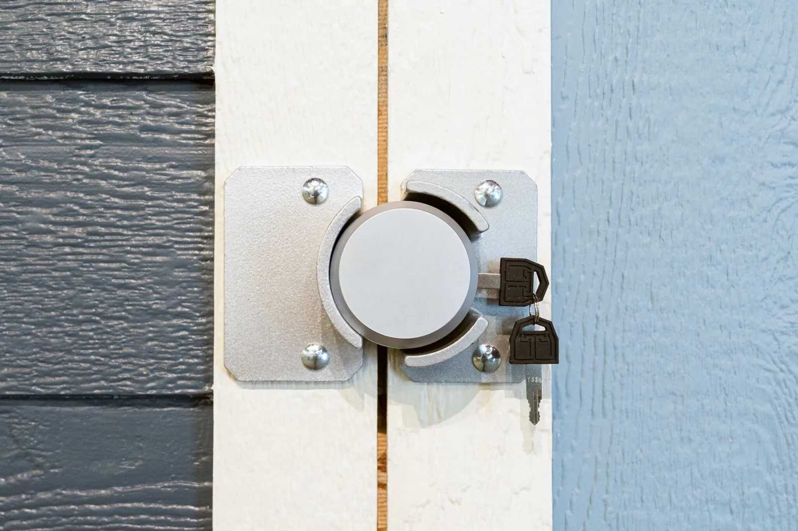 Silver puck lock on Tuff Shed