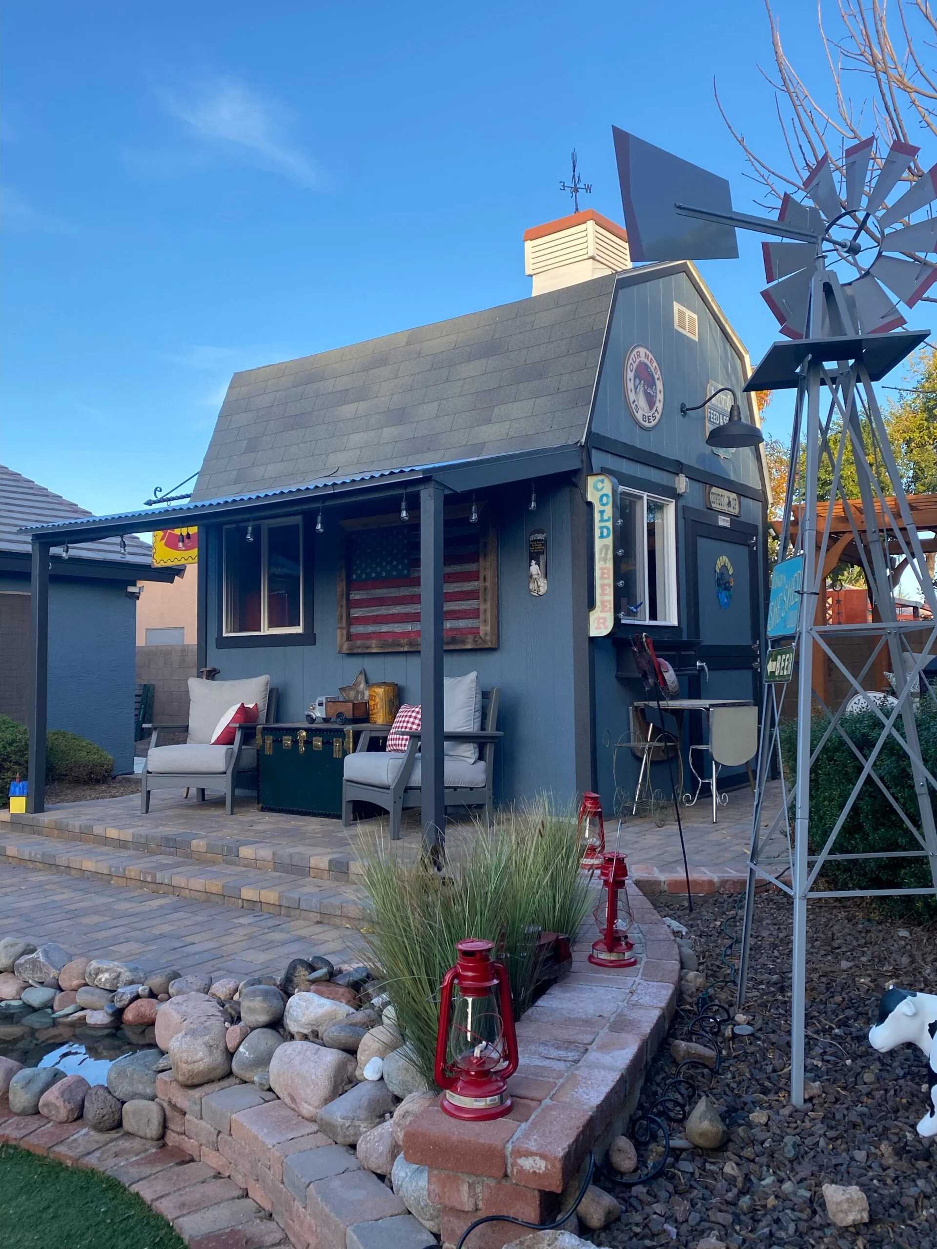 TB-800 Backyard retreat used for a hangout space. With decorations in the front of the lawn and finished stone walk way.