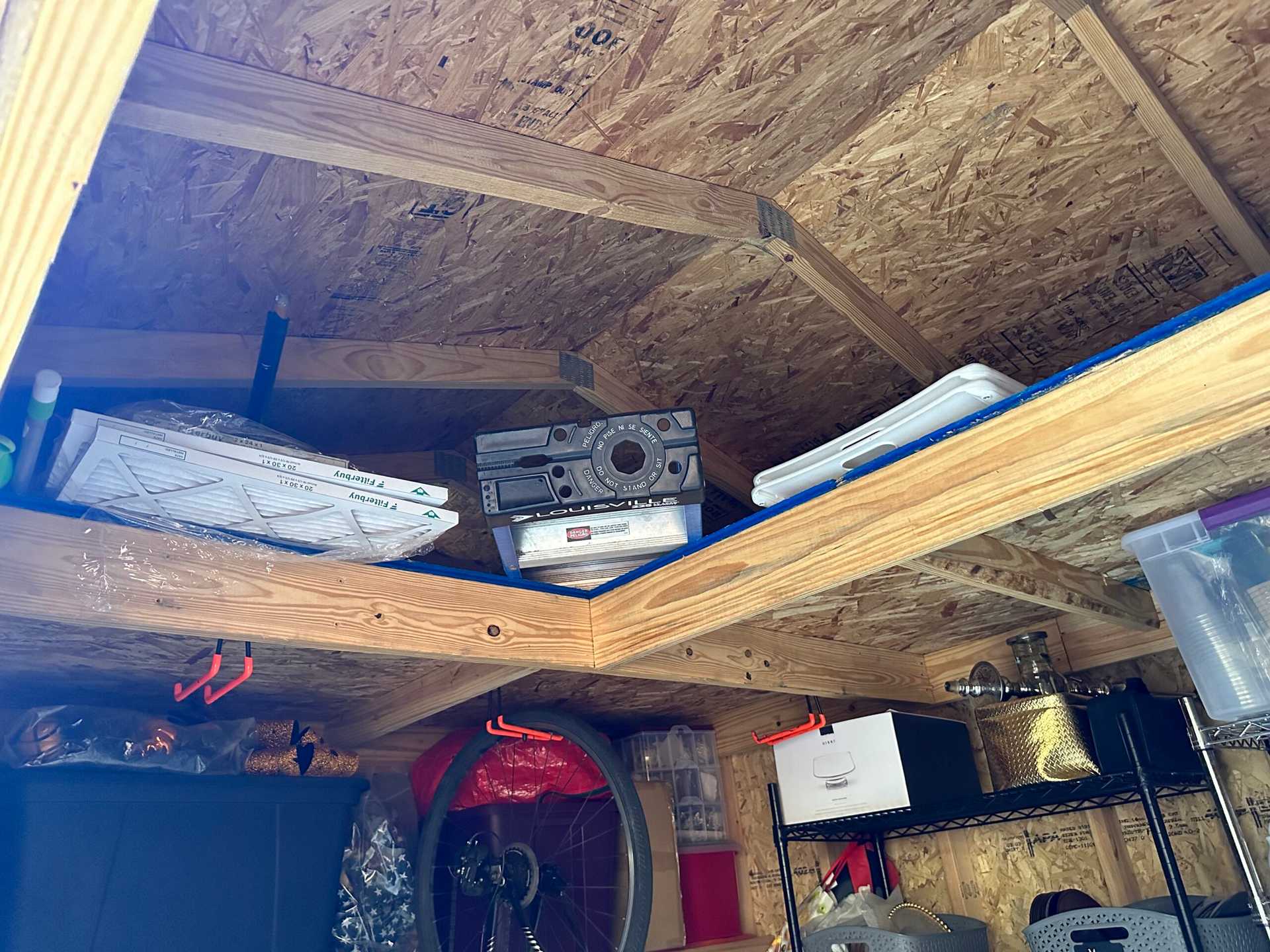 A TR-800 shed with loft used for storage.