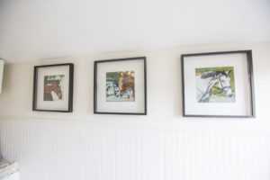 Bethany's photos hang on the walls