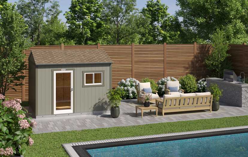 Garden with a wooden shed, patio furniture, an outdoor kitchen, and a swimming pool, surrounded by trees and a wooden fence.