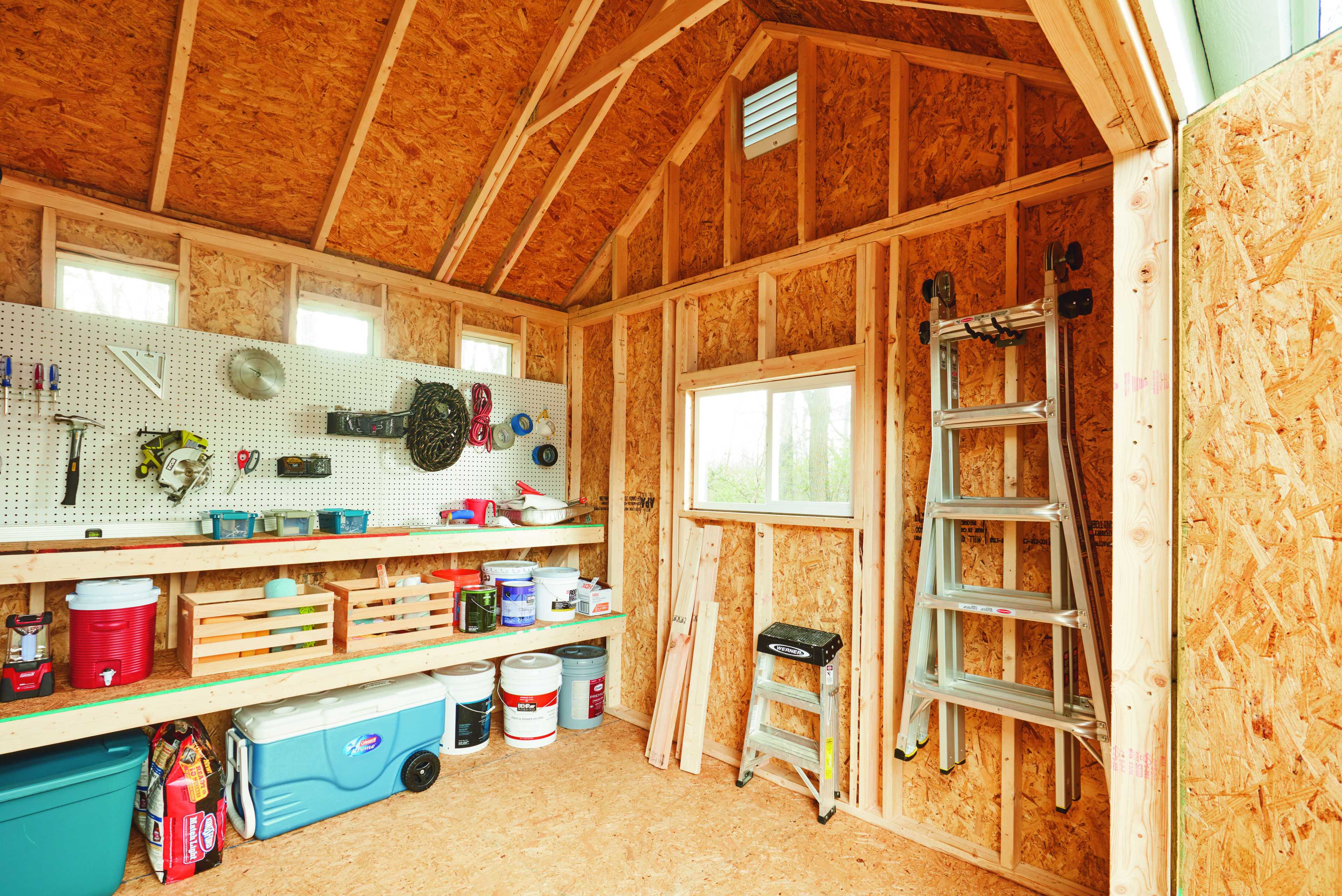 Tuff Shed ment for storage for tools. With tools on the bench and storage underneath.
