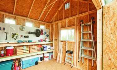 Tuff Shed ment for storage for tools. With tools on the bench and storage underneath.