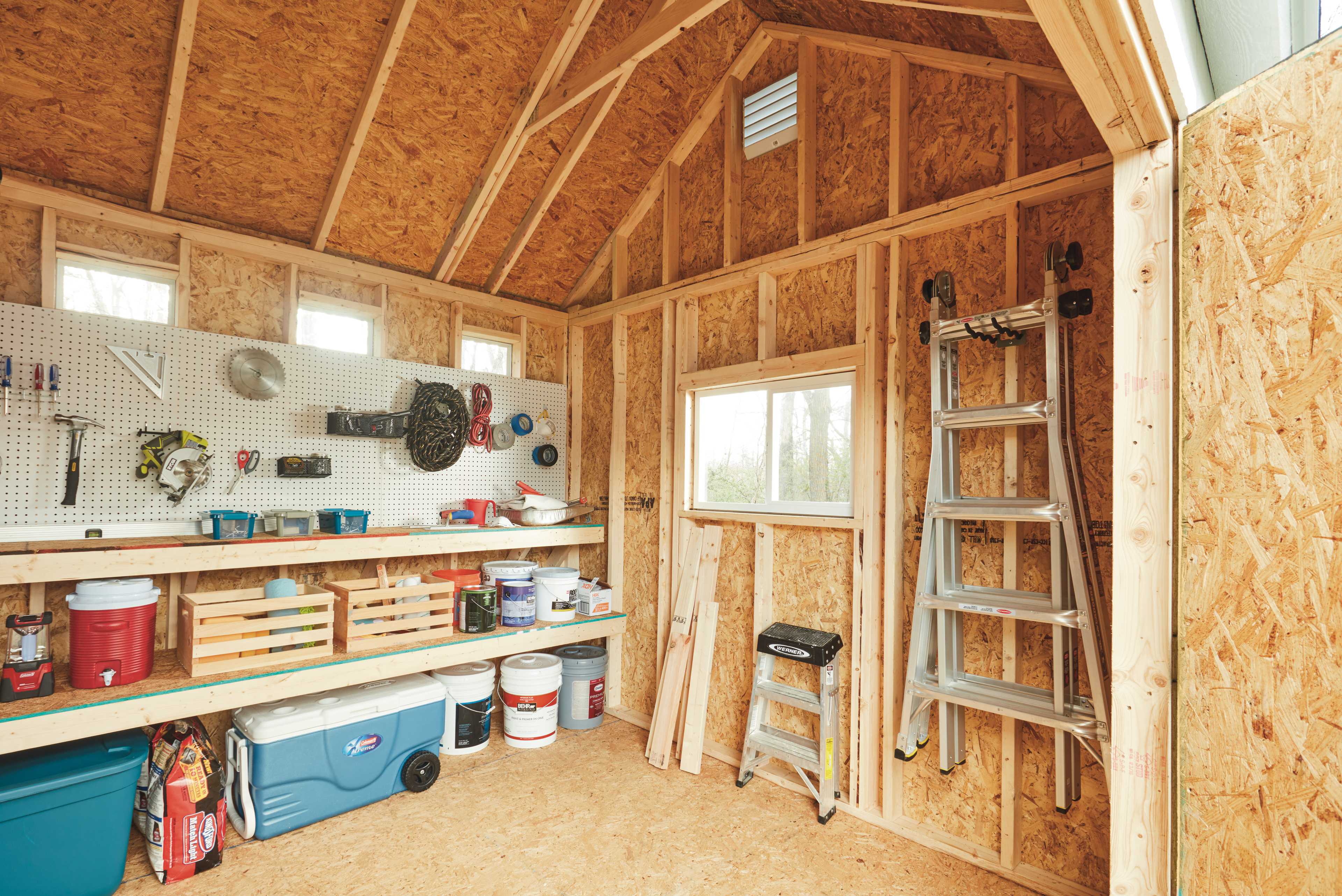 Tuff Shed ment for storage for tools. With tools on the bench and storage underneath.